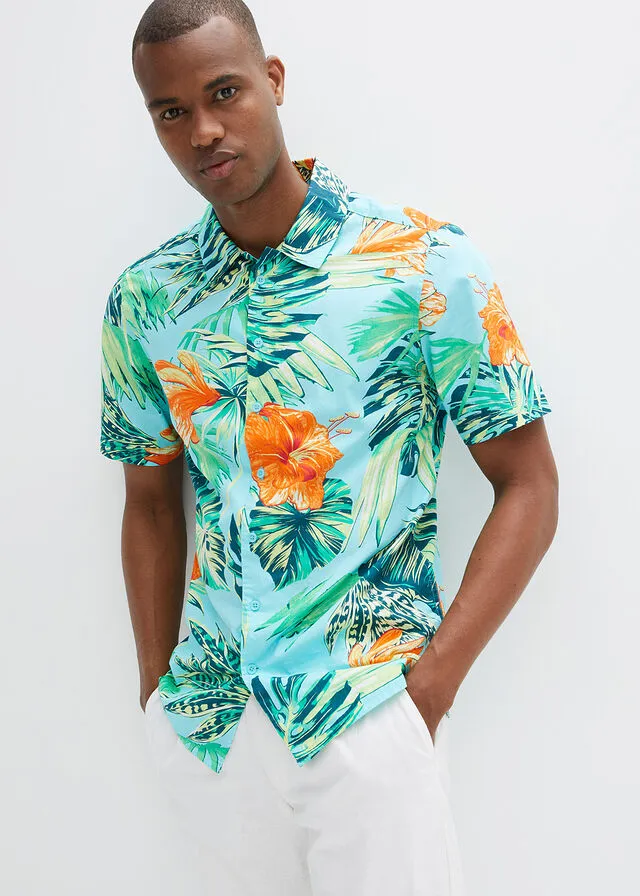 Short sleeve light blue printed shirt.