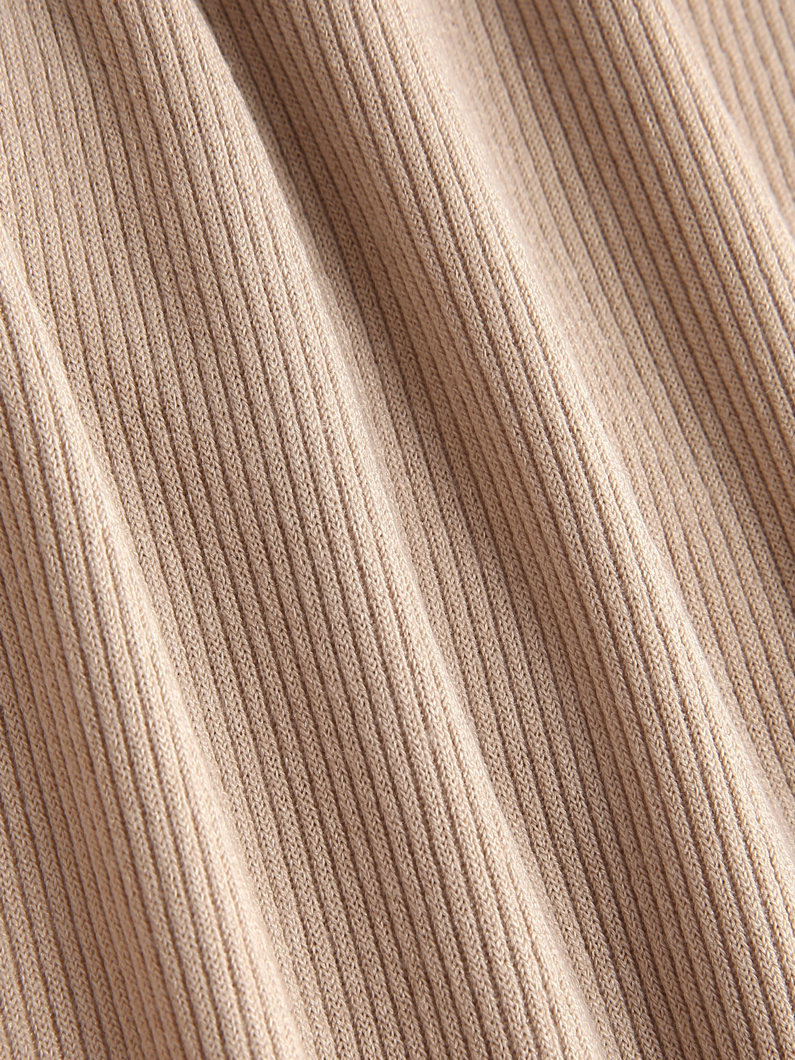 Solid Ribbed Midi Skirt with Asymmetrical Hem and Ruched Detail